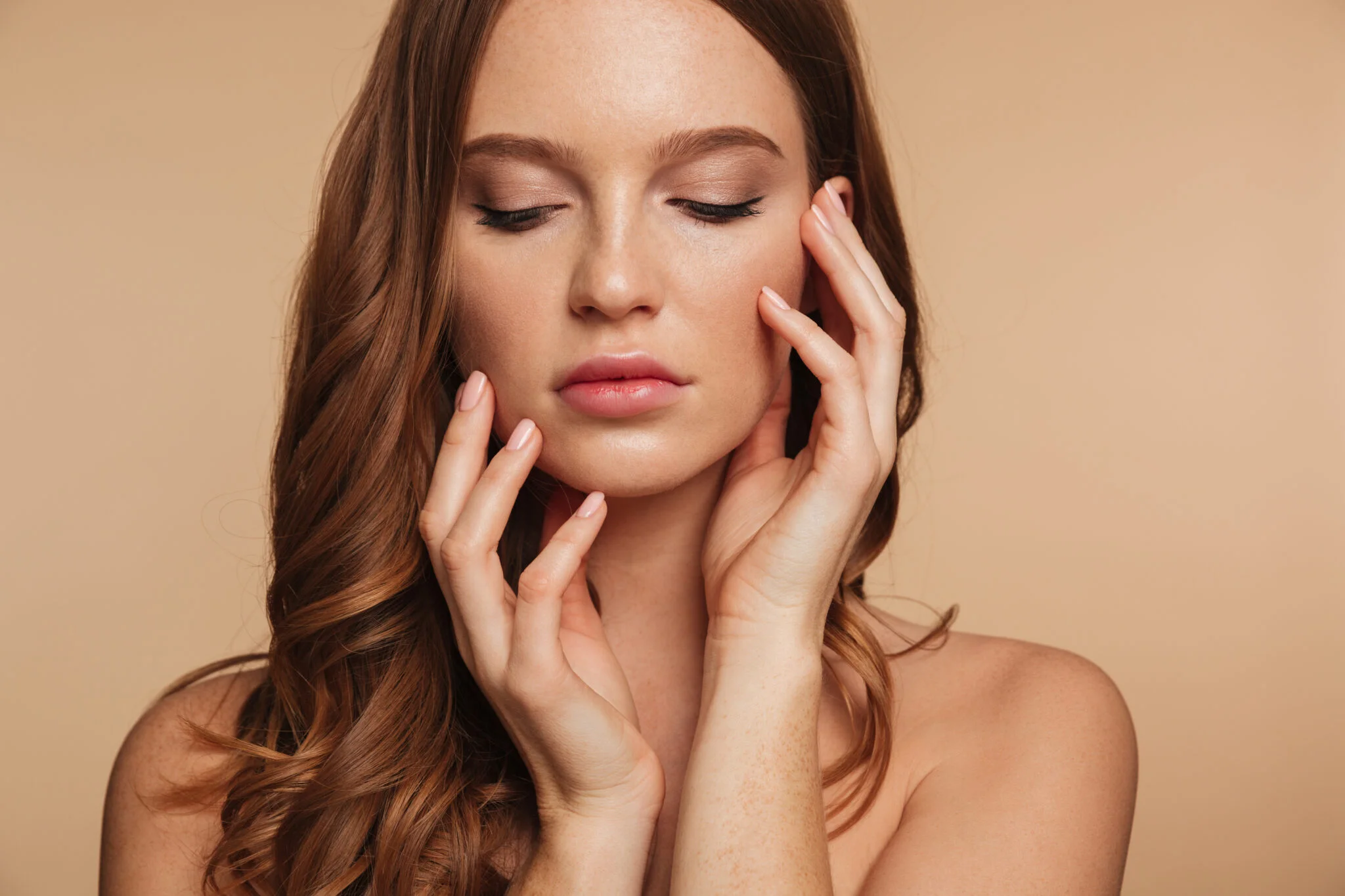 Close-up Beauty portrait of sensual ginger woman with long hair